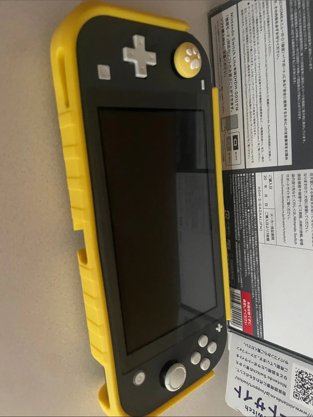 Nintendo Switch Lite Gray with Yellow Case with game